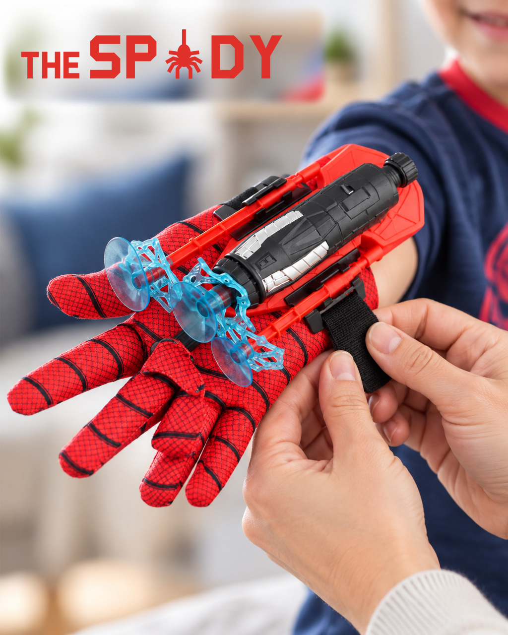 A parent fitting the Web Shooter onto a child's wrist